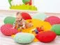 Preview: Cuddly pillow flower with playing toddler Preview: Cuddly pillow flower with playing toddler