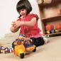 Preview: TOLO First Friends on wheels with happy playing girl Preview: TOLO First Friends on wheels with happy playing girl
