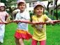 Preview: rotes Tau mit Kindern im wetteifern als Team Preview: rotes Tau mit Kindern im wetteifern als Team