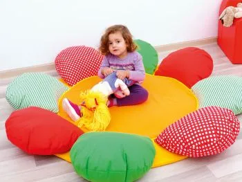 Cuddly pillow flower with sitting girl Cuddly pillow flower with sitting girl