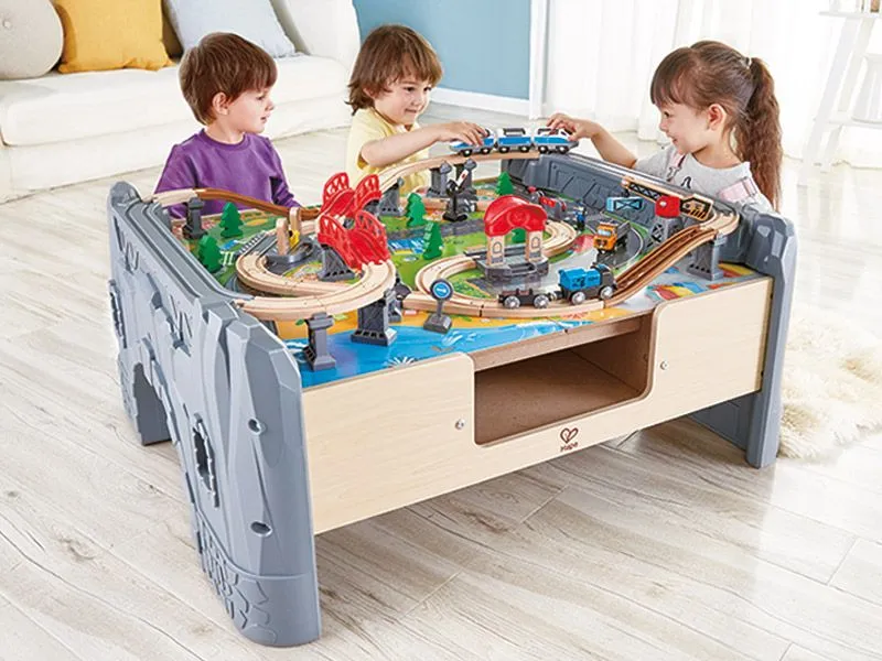 Railway-game-table-Lok-Mountain-built-with-happy-playing-children