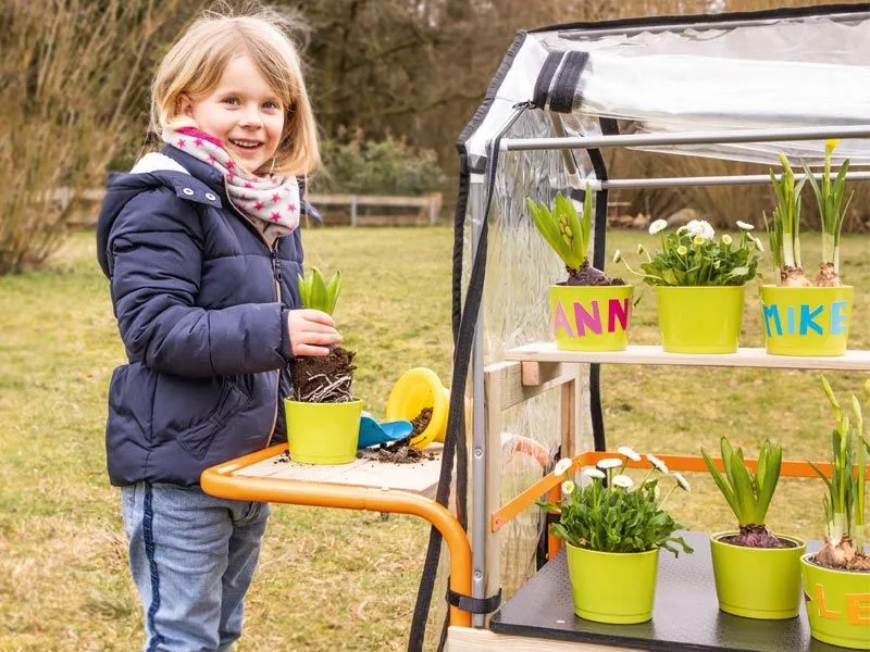 Mobile greenhouse with child Detail shelf for potting Mobile greenhouse with child Detail shelf for potting