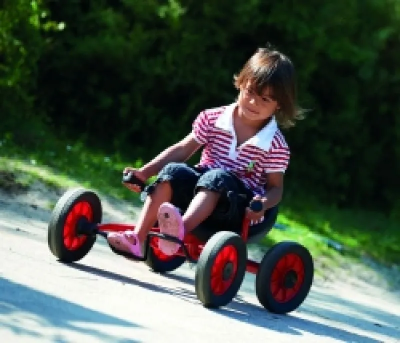 winther fun cart with happy children on the playground winther fun cart with happy children on the playground